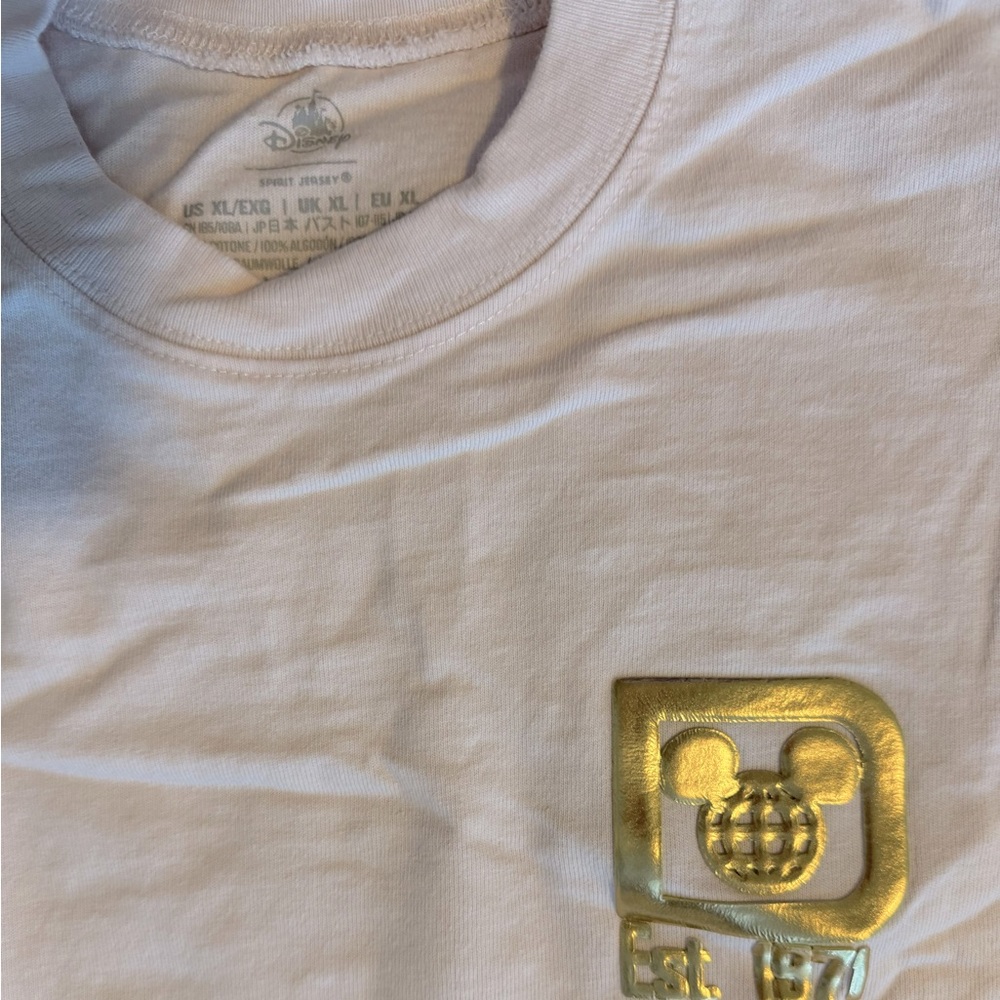 Disney Spirit Jersey. Gold and pink. Size XL.